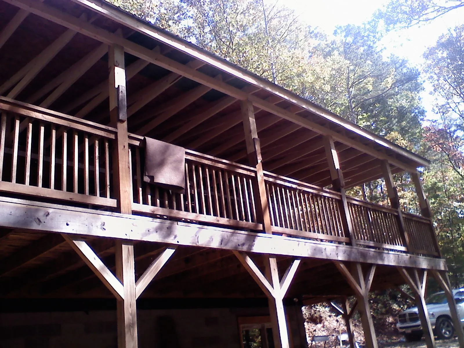 Timber framing under a new elevated porch and deck — Roof Leak Repair in Scott by Roofing Brothers